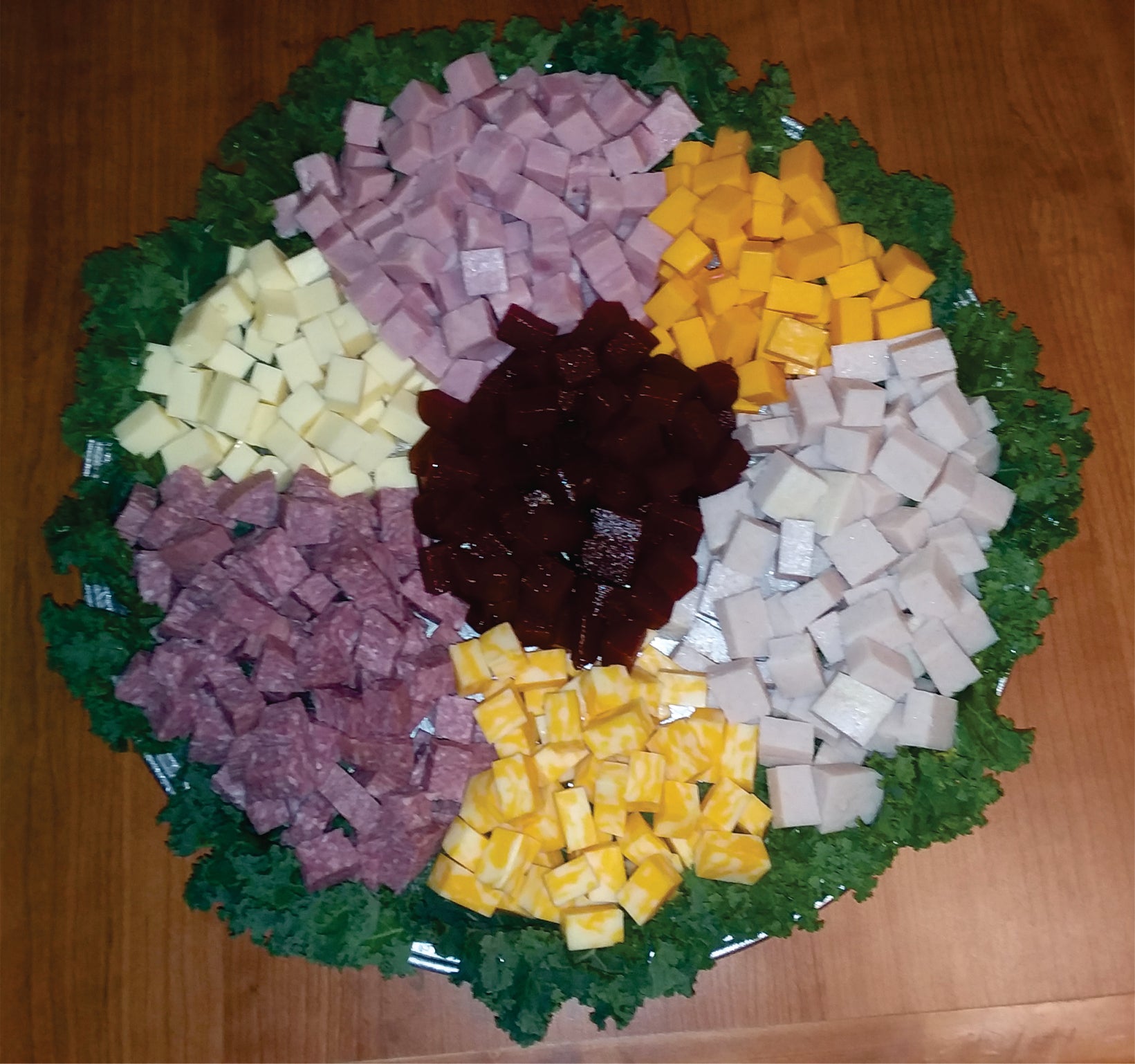 Assortment of Cold Cuts Ham, Turkey, Salami, 3 kinds of  Cheese and Guava Paste Serve* 25 to 30 guests
