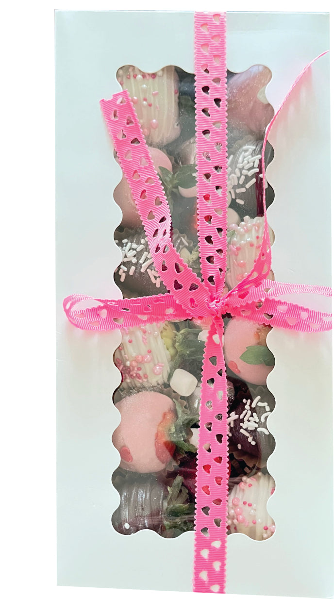 Strawberries with Chocolate Desserts, decorated with white chocolate and toppings of different colors.
