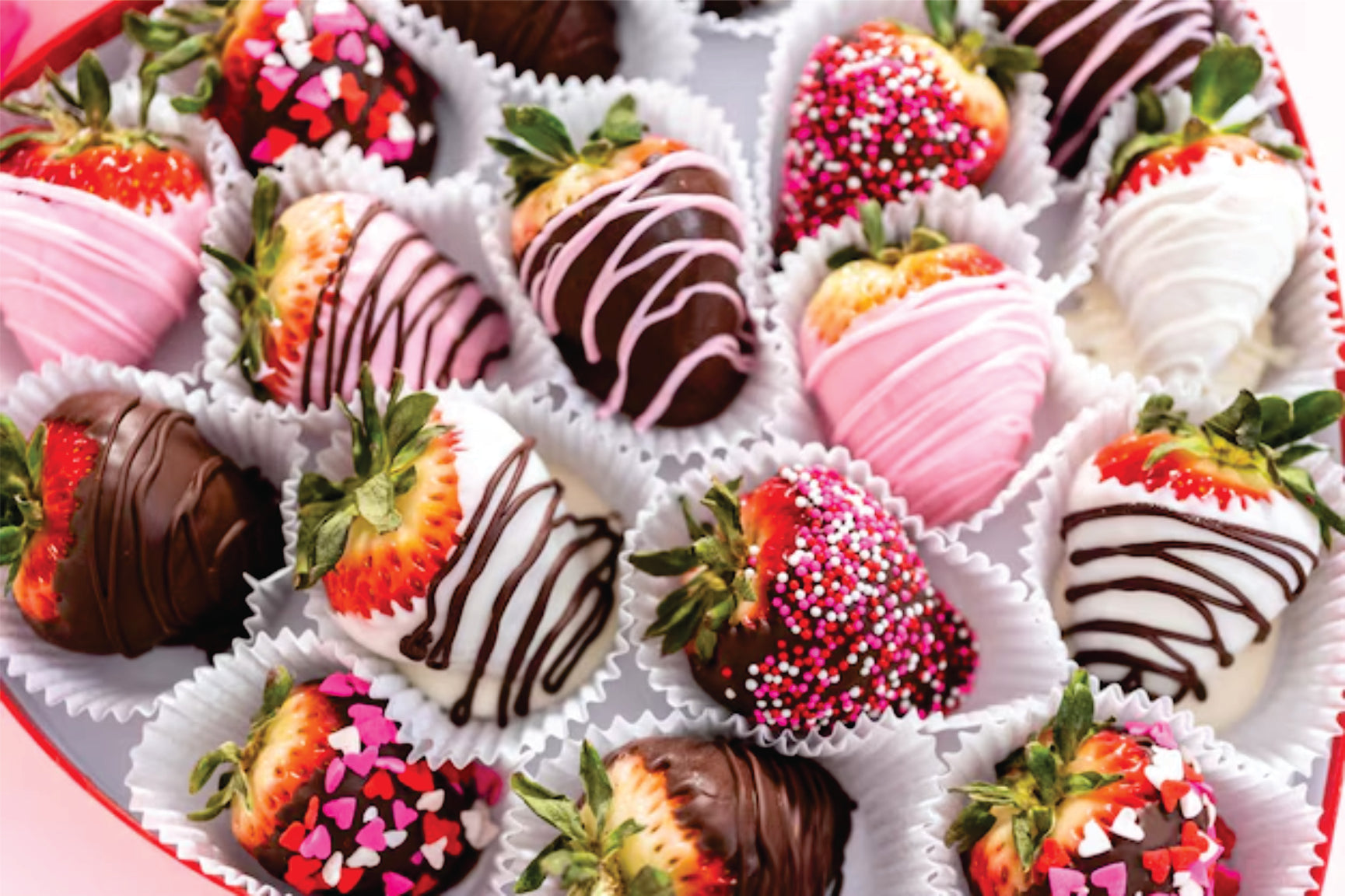 Strawberries with Chocolate Desserts, decorated with white chocolate and toppings of different colors.